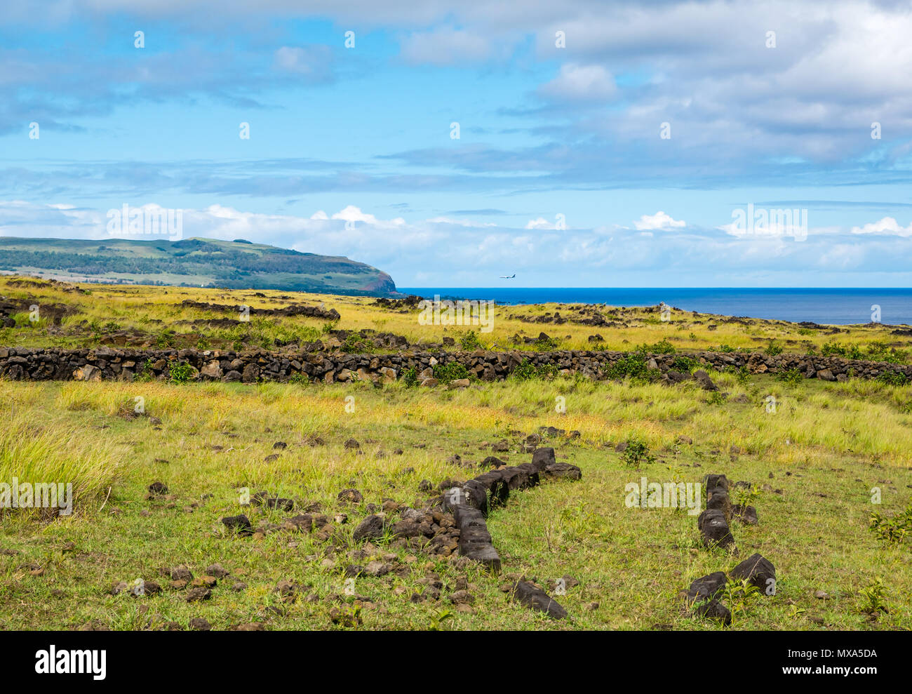 Outline remains of traditional boat shaped village house called Hare Peanga,Te Peu, Easter Island, Rapa Nui, Chile Stock Photo