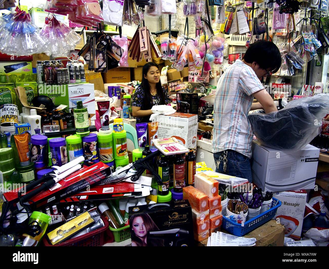 DIVISORIA, MANILA CITY, PHILIPPINES - MAY 14, 2018: Assorted salon supplies on display at a bazaar stall inside a big shopping mall. Stock Photo