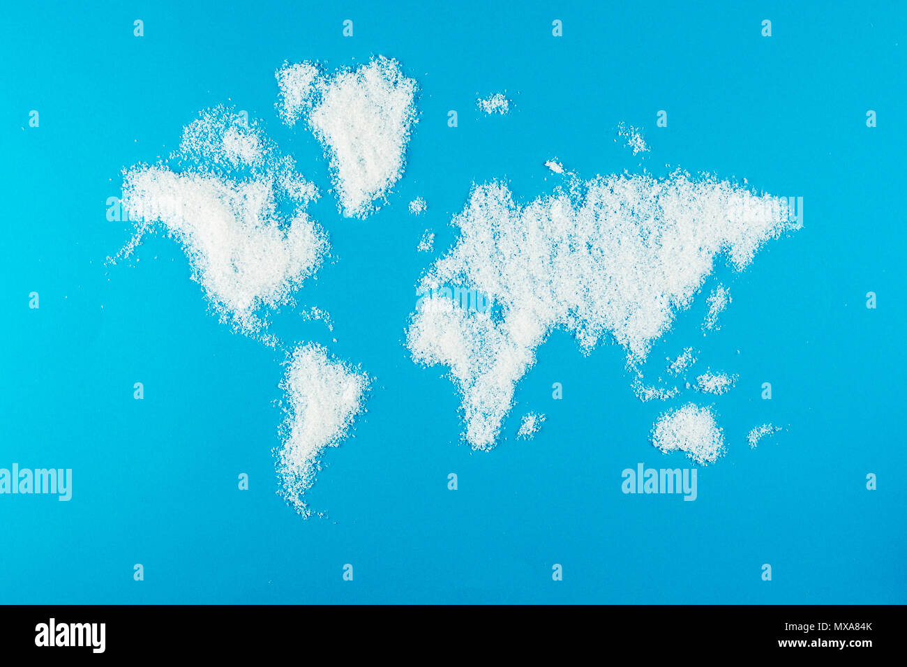 map of the world made of snow on blue backgound Stock Photo