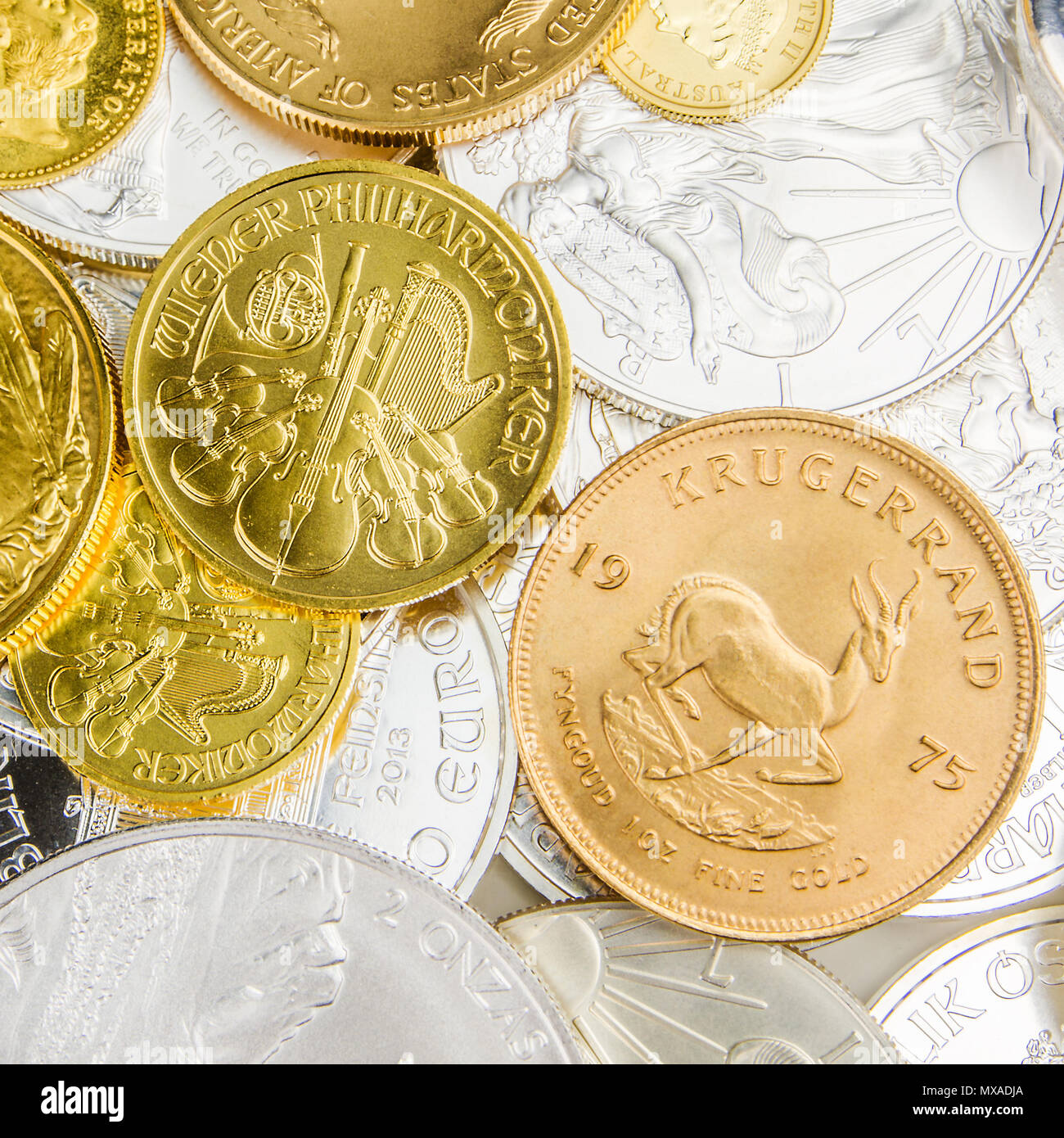 mixture of silver and golden coins with different nominal value and