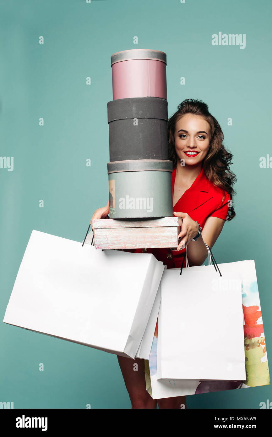 Beautiful fashionable lady with shopping bags and boxes Stock Photo Alamy