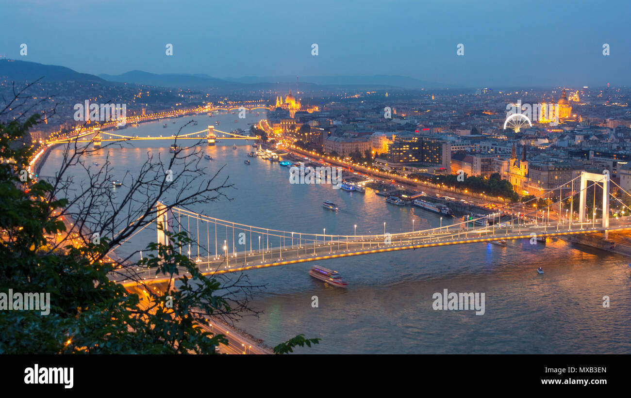 Budapest city at blue hour with illuminated Chain Bridge and Hungarian Parliament on Danube River, picturesque evening cityscape Stock Photo