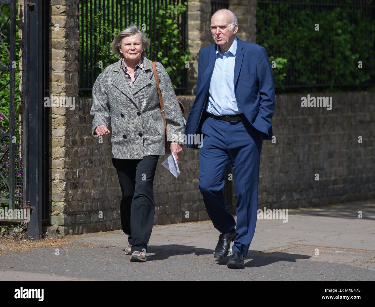 Liberal Democrat leader, Vince Cable MP, casts his vote alongside his wife  Rachel in the local elections. Heatham House, Twickenham, London, UK.  Featuring: Rachel Smith, Vince Cable MP Where: London, England, United