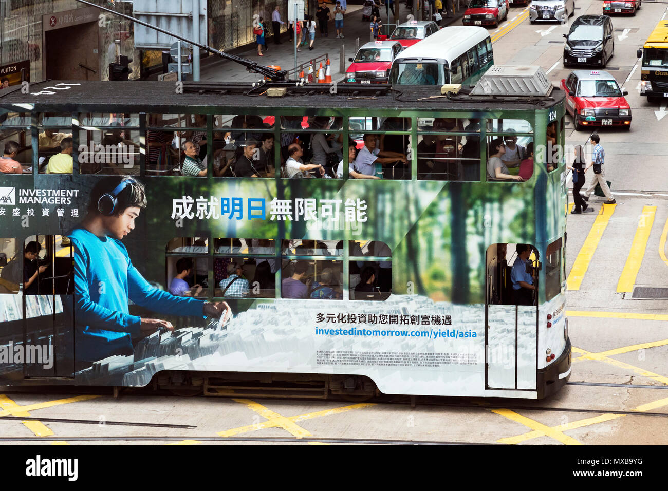 Tram and passengers in Central, Hong Kong, SAR, China Stock Photo