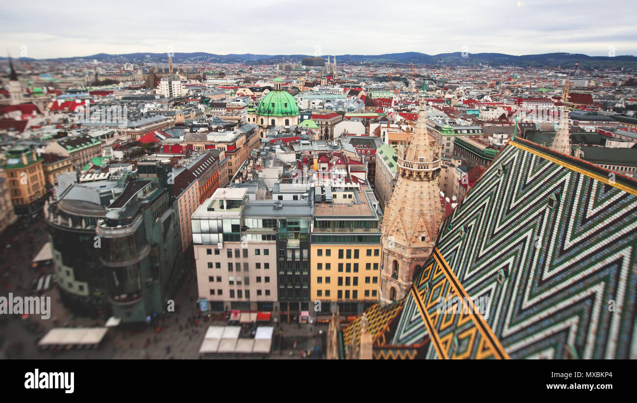 Beautiful super-wide angle aerial view of Vienna, Austria, with old town Historic Center and scenery beyond the city, shot from observation deck of Sa Stock Photo