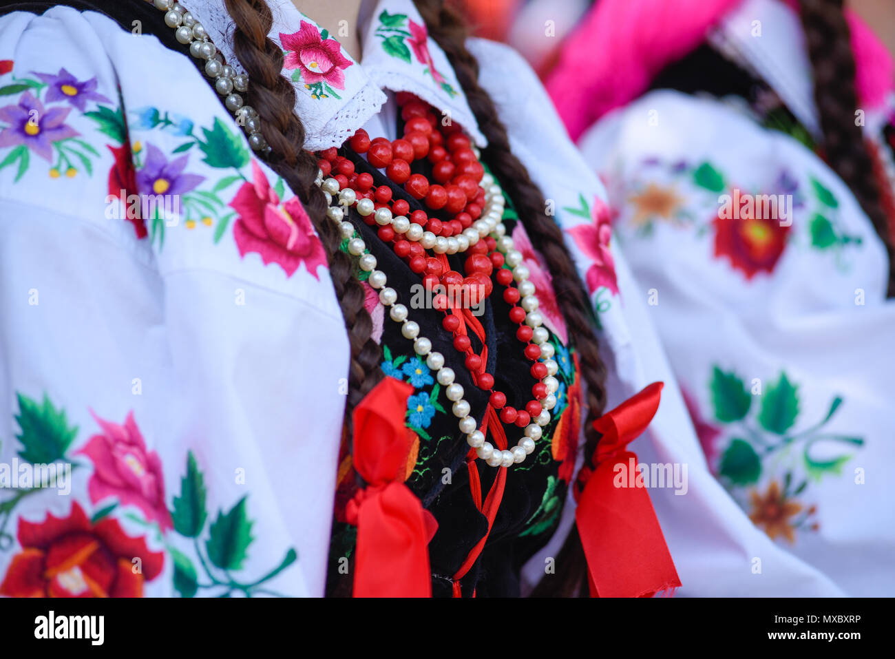 Regional, folklore costumes, colorful handmade shirts with symbols