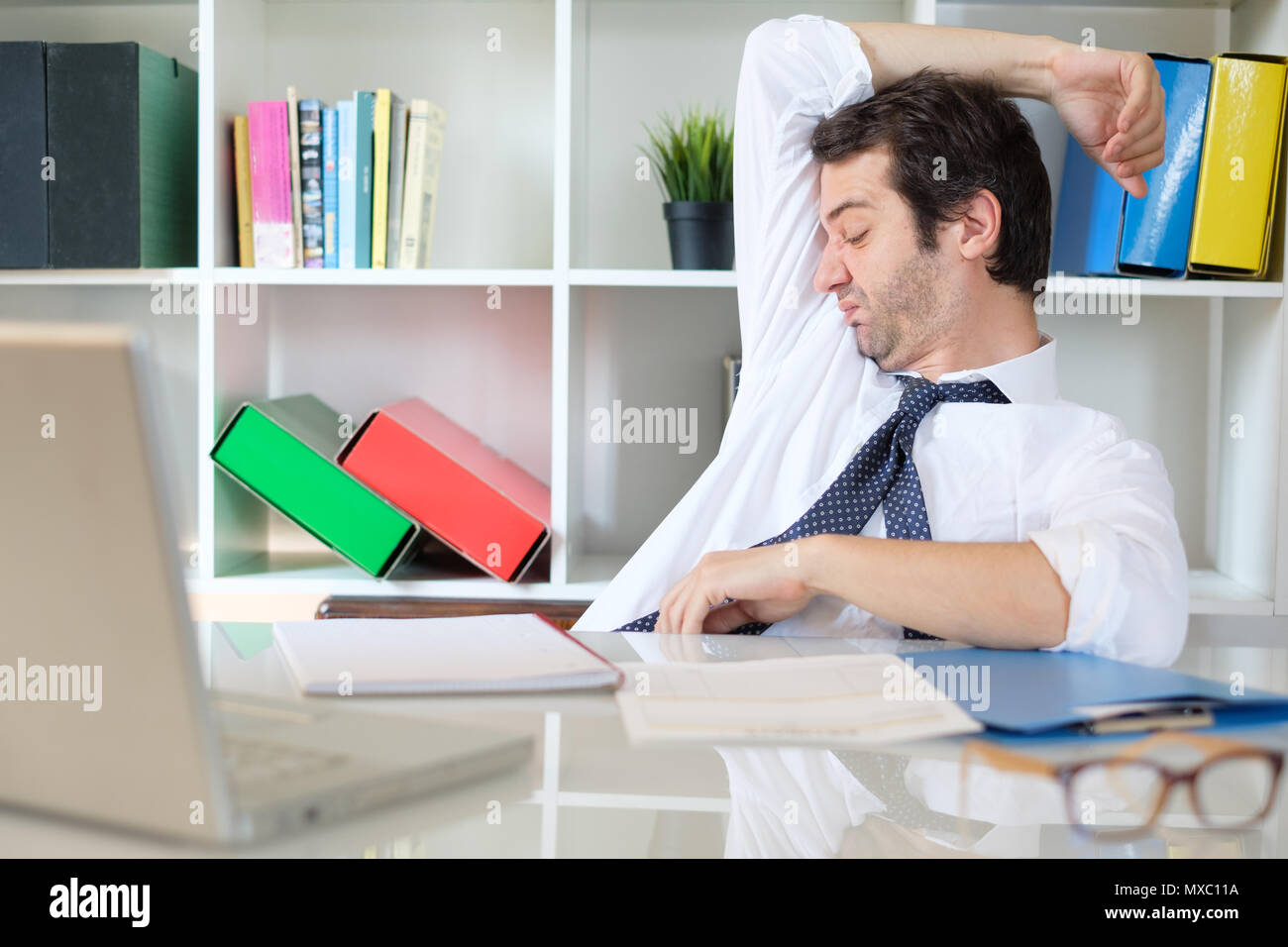 One businessman bad underarm odor at work Stock Photo Alamy