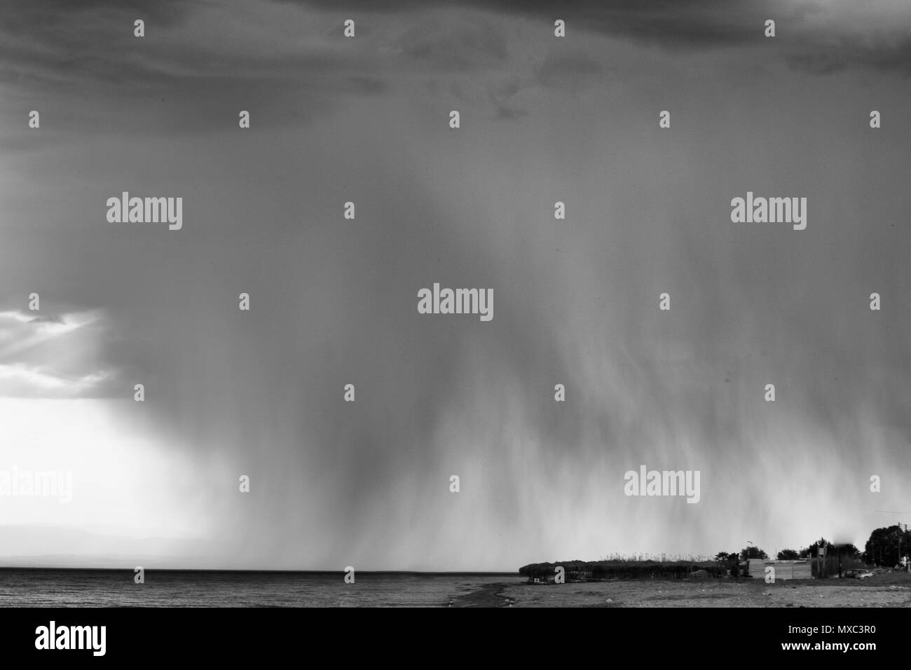 Cloudy sky in light Black and White Stock Photos & Images - Alamy