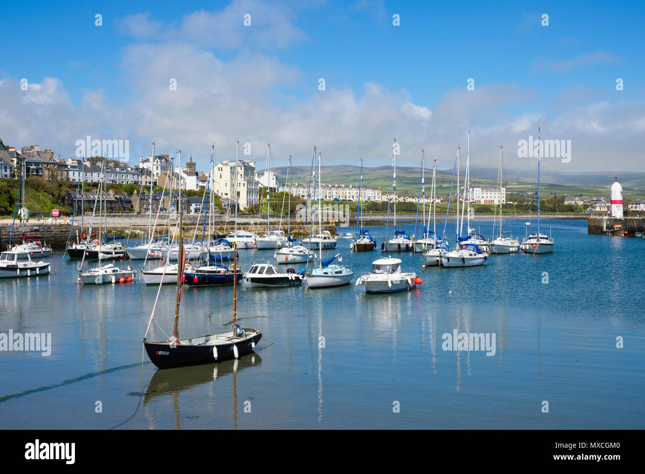 Boats moored in pretty harbour at Port St Mary, Isle of Man, British Isles Stock Photo