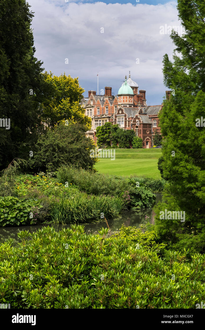 Sandringham house and west lawn, Built in 1870 a classic Victorian architecture, Norfolk, England, UK Stock Photo