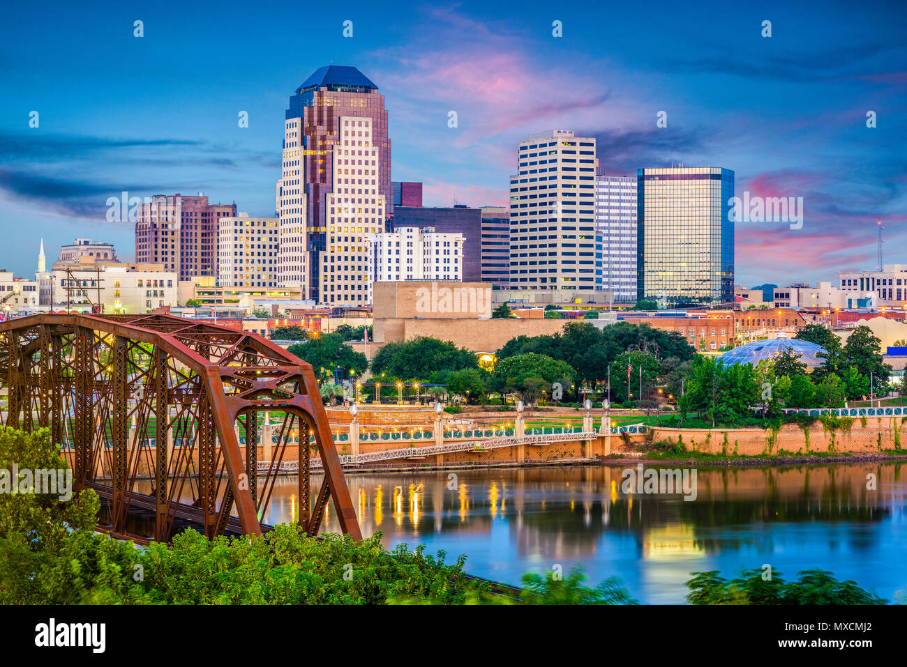 Shreveport, Louisiana, USA skyline over the Red River at dusk. Stock Photo