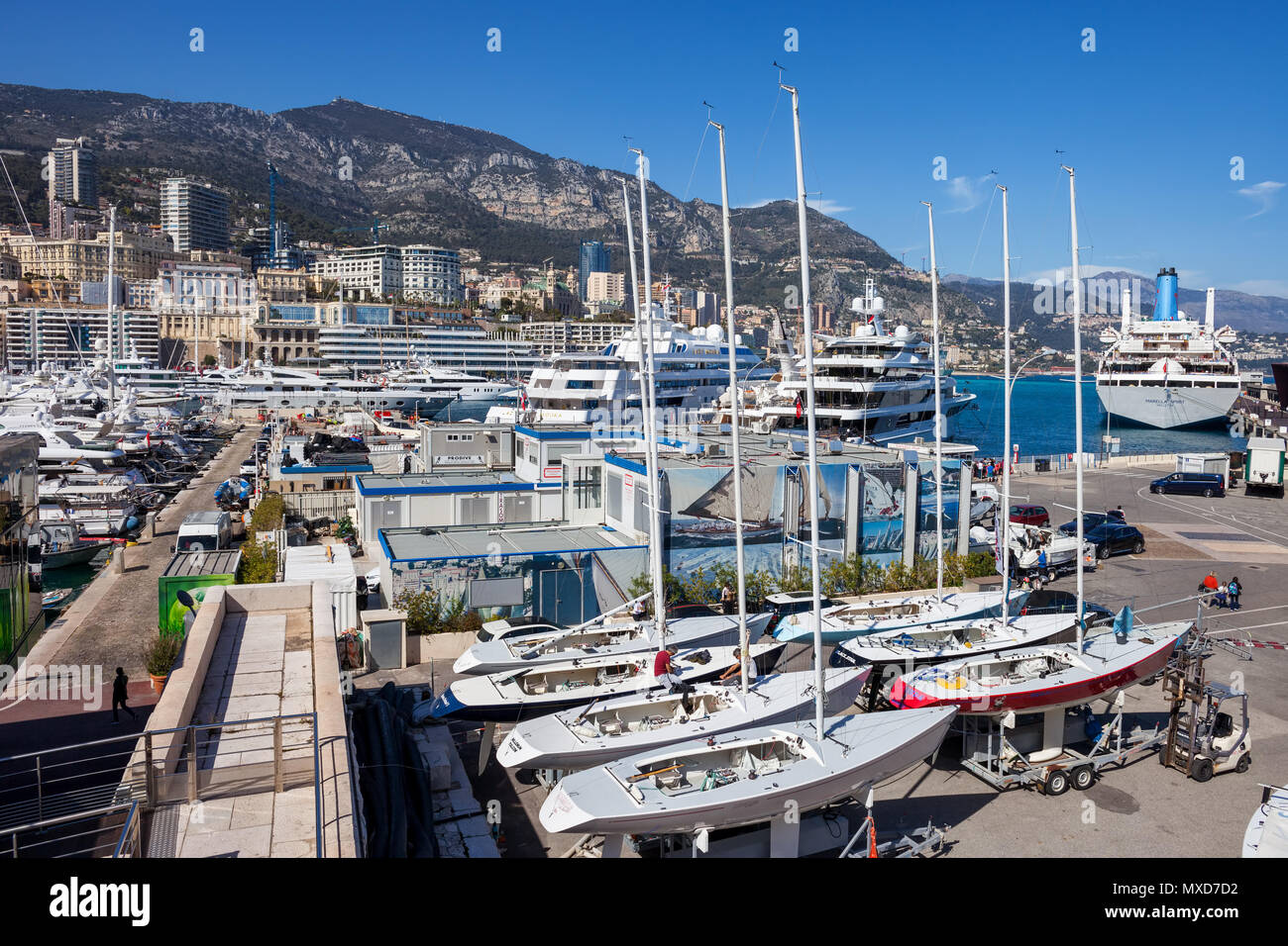 Monaco principality, sailing boats in dry dock and yachts in Port Hercule on Mediterranean Sea Stock Photo