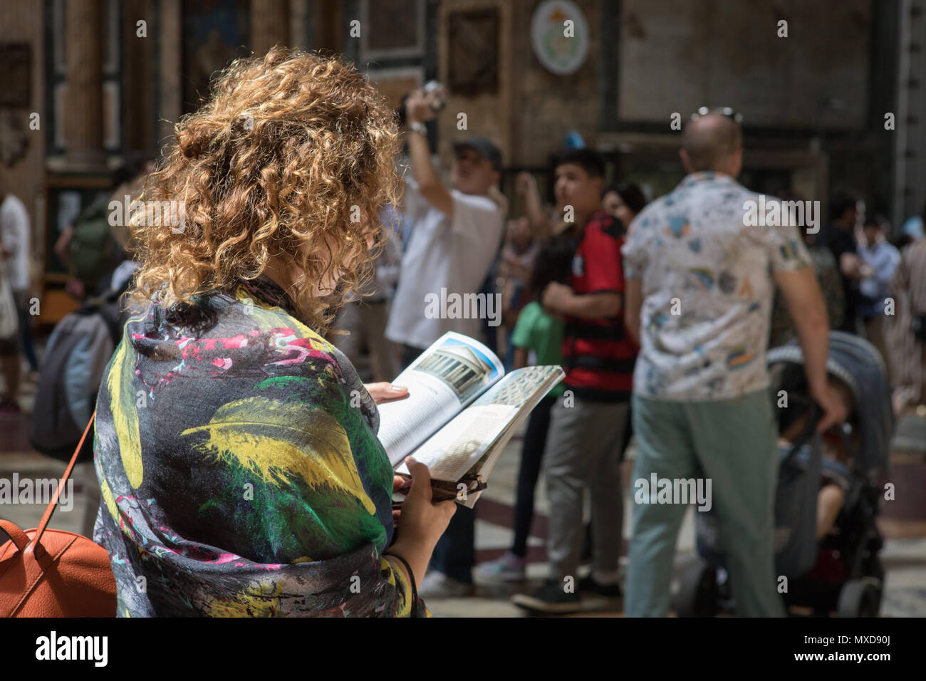 Rome Pantheon, tourist woman looking a guide visiting historical site Stock Photo