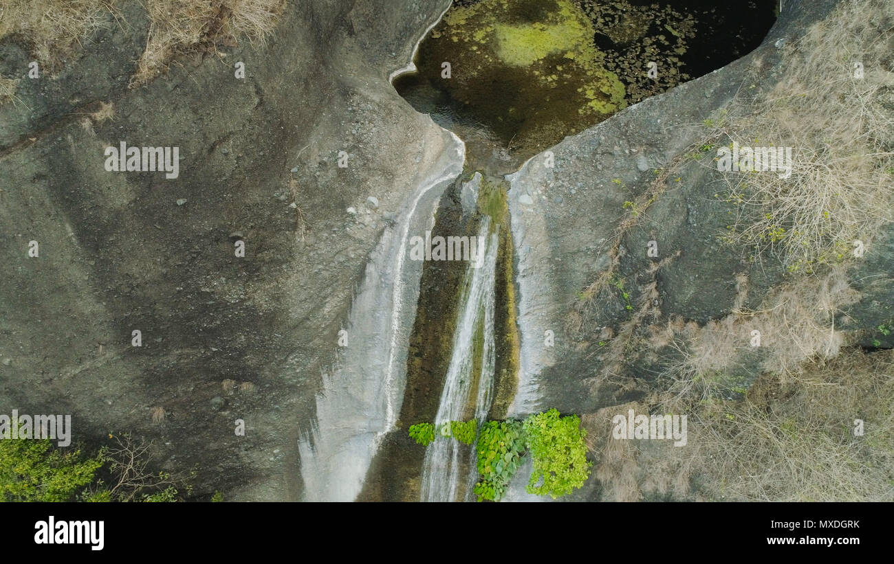 Aerial view of waterfall in the mountains of Filipino cordillera
