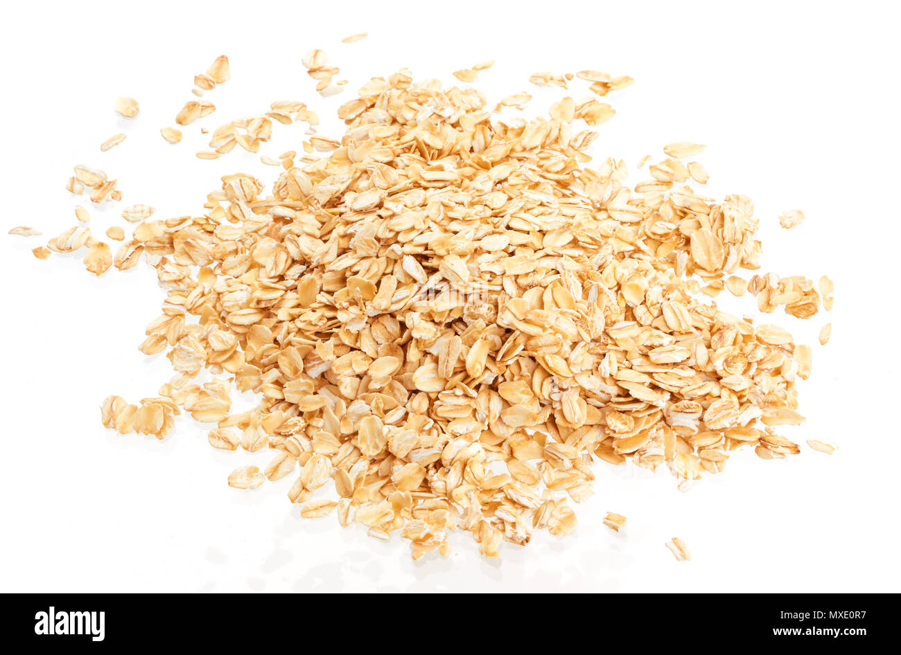 Pile of oat flakes isolated on white background. Top view Stock Photo