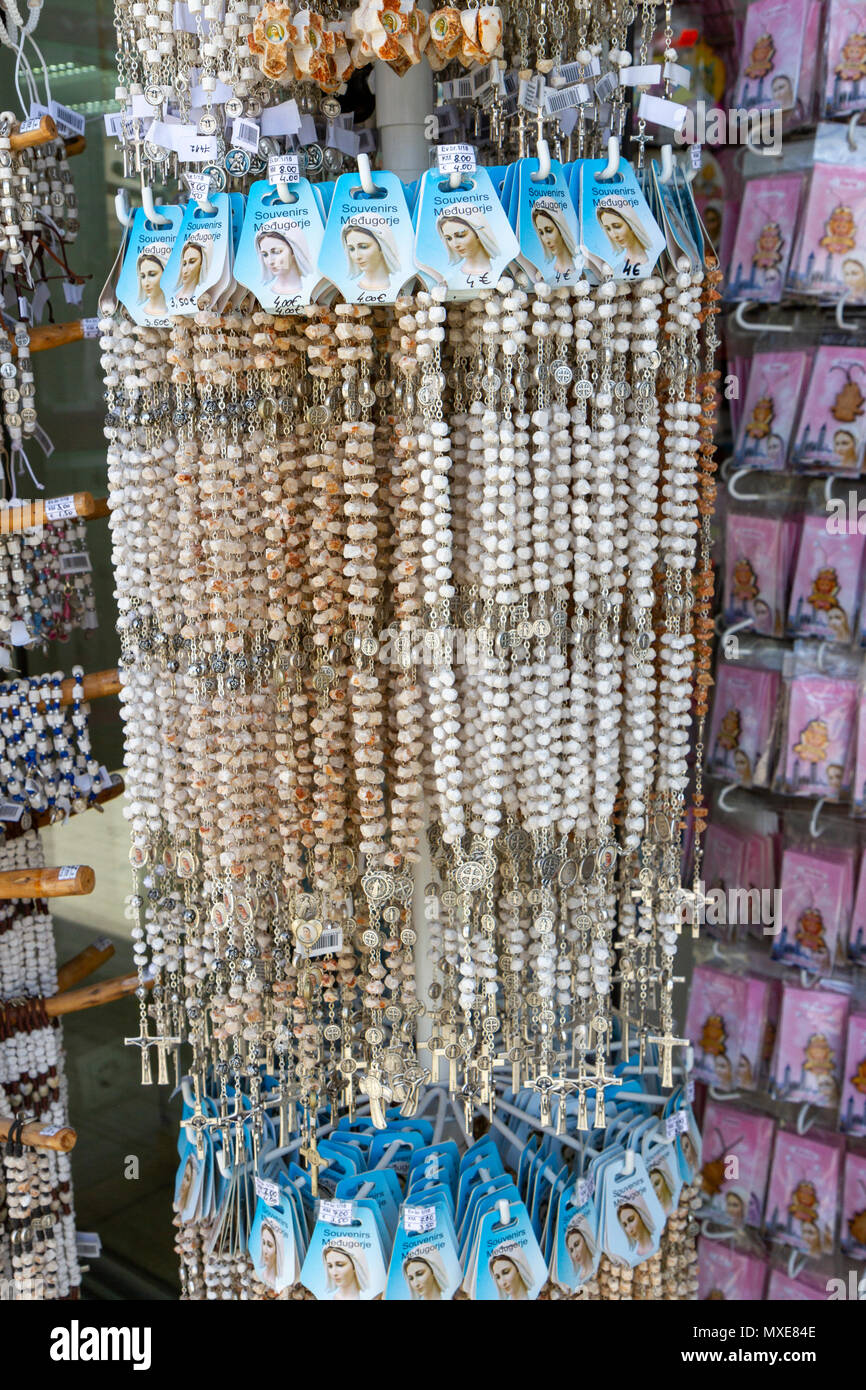 A shop display of rosary beads (religious gifts) in Međugorje (or Medjugorje), in Federation of Bosnia and Herzegovina. Stock Photo