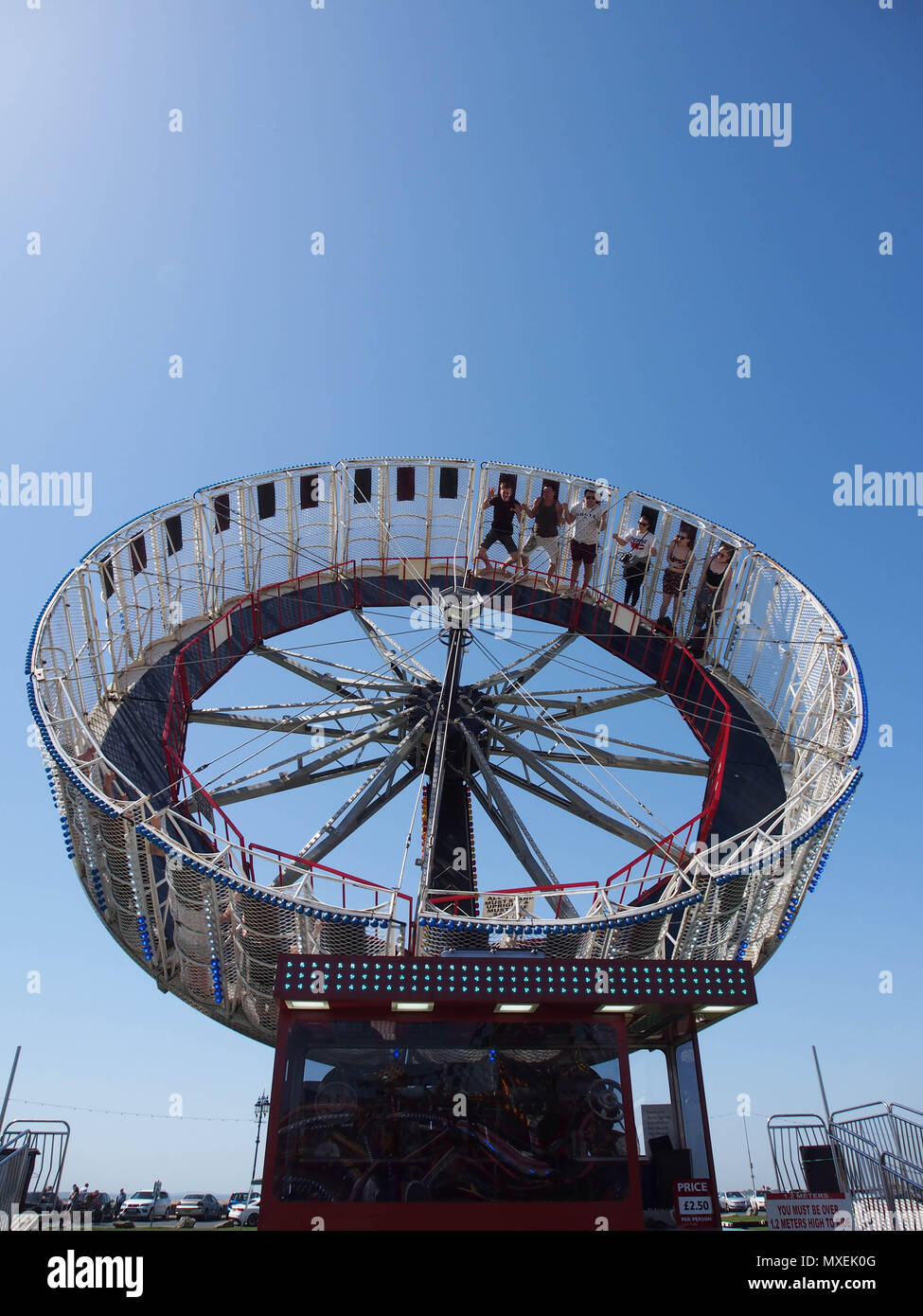 A spinning fairground ride Stock Photo