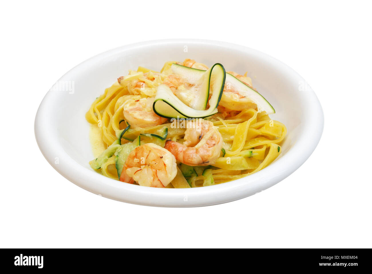 Tagliatelle with shrimp and zucchini Stock Photo