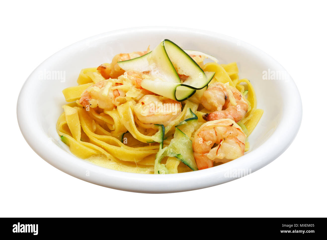 Tagliatelle with shrimp and zucchini Stock Photo