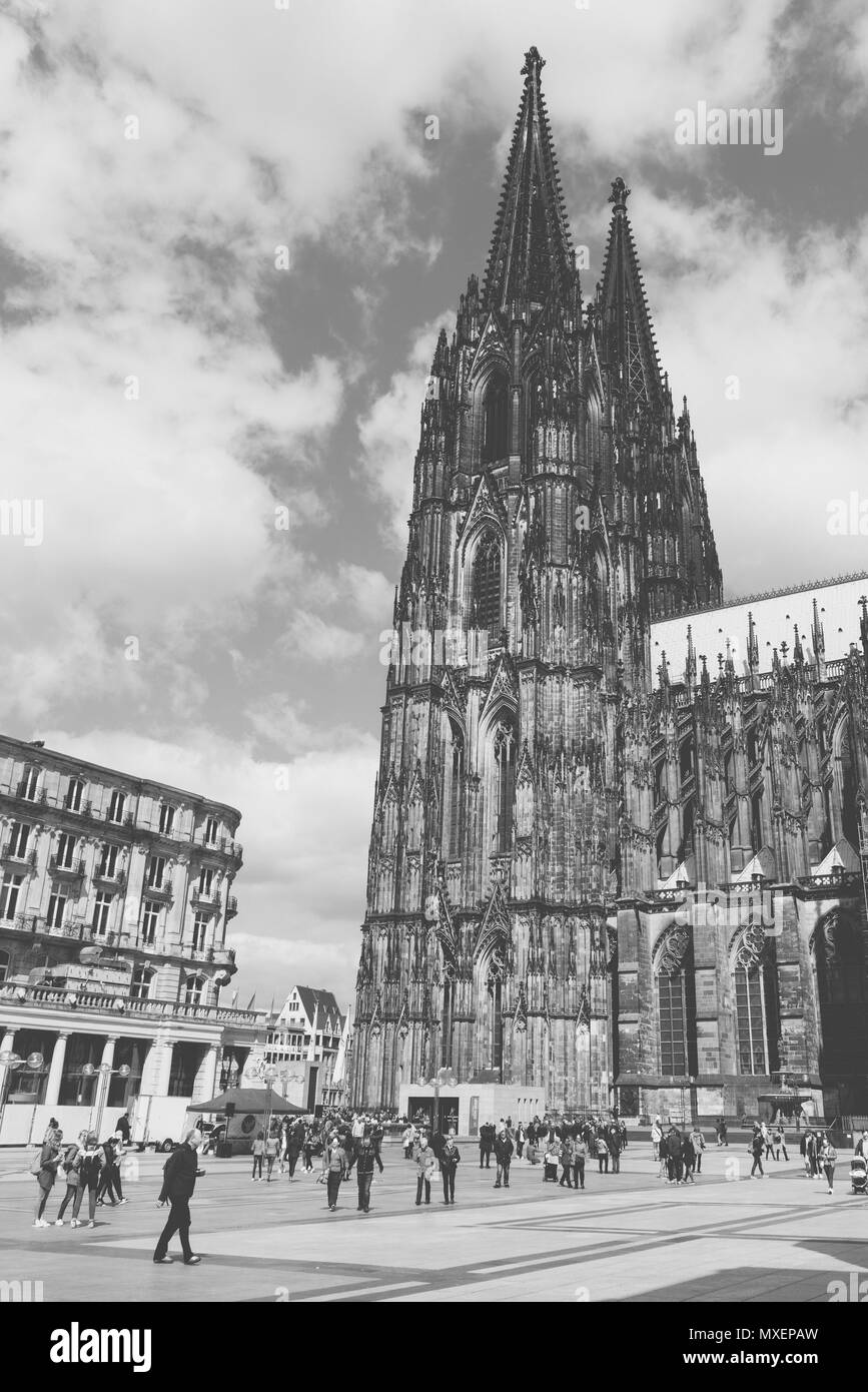 The Cathedral in Cologne, Germany is one of the most impressive buildings in the world. The place in front of the „Dom“ is called „Domplatte“. Stock Photo
