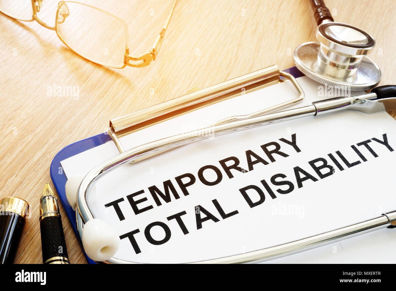 Diagnosis Temporary Total Disability (TTD) and stethoscope. Stock Photo