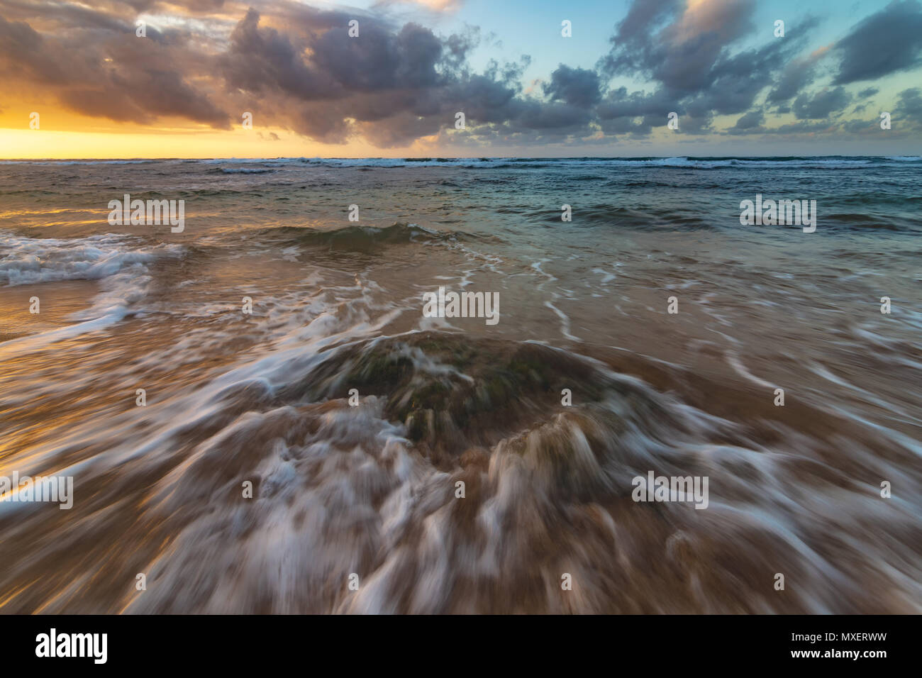 A dramatic sunset looking over the Pacific Ocean. Kauai, Hawaii Stock ...