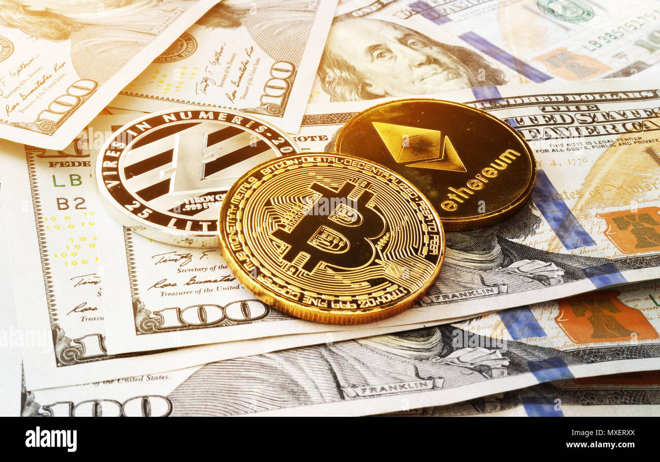 Bitcoin, litecoin on dollar bills background. Traditional currency and  cryptocurrency as digital payment method. Wealth and income concept. High  quality photo Stock Photo - Alamy