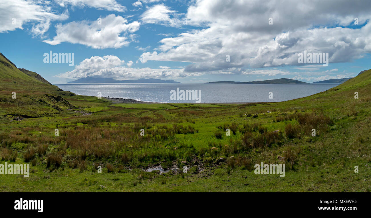 Glen Scaladal and Scaladal Bay on the Isle of Skye, with the Scottish Islands of Rum (left) and Soay (right) in the distance. Stock Photo