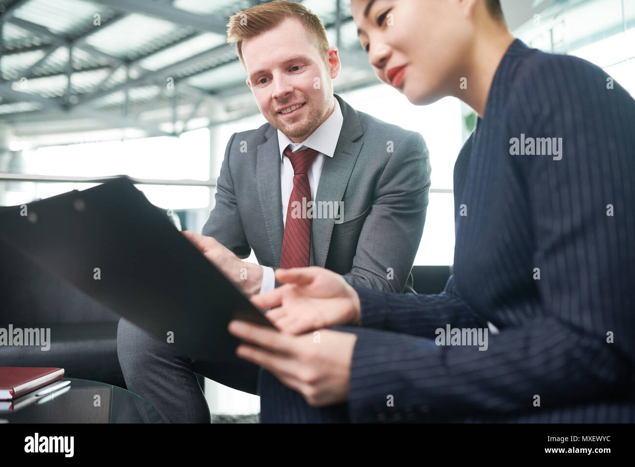 Financial Managers Wrapped up in Work Stock Photo