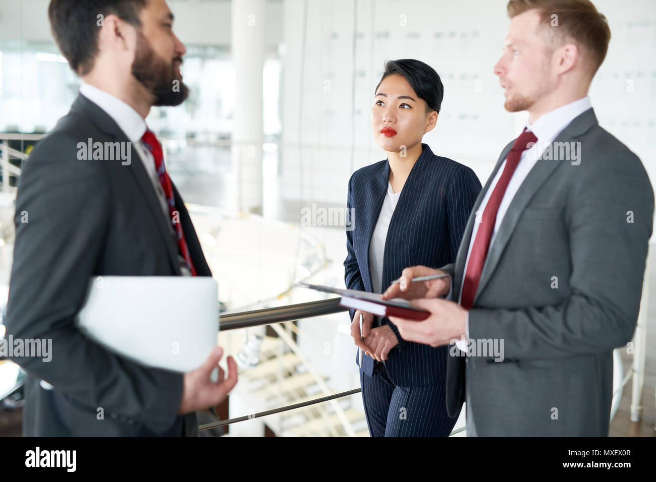 Colleagues Having Informal Working Meeting Stock Photo