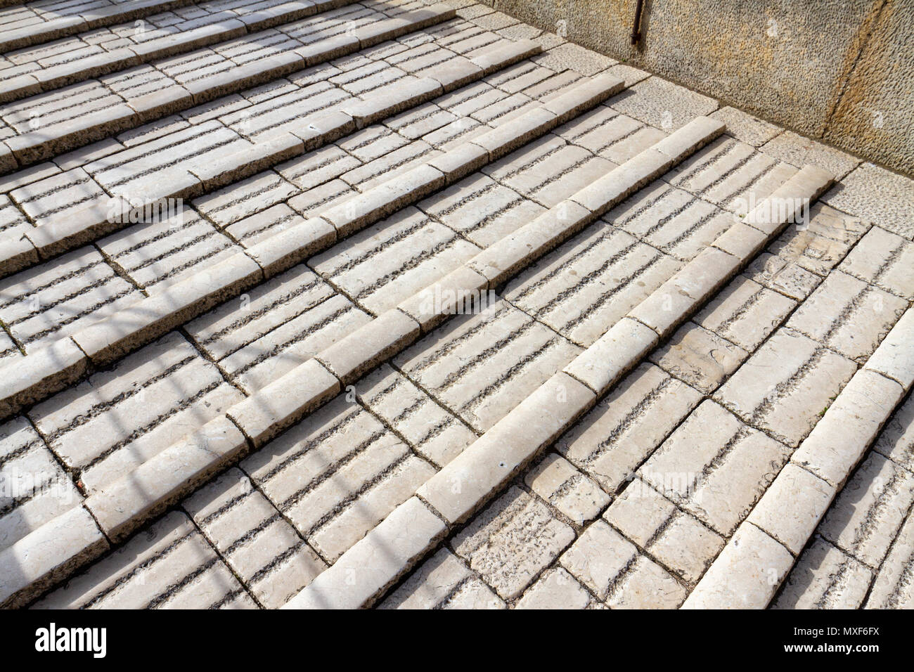 Detail showing the uneven surface of the walkway across the historic Stari Most (Old Bridge) in Mostar, the Federation of Bosnia and Herzegovina. Stock Photo