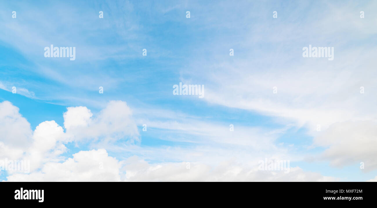 blue sky with white, soft clouds Stock Photo - Alamy