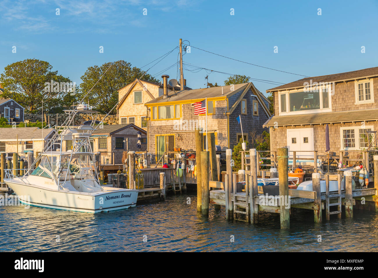Boats docked in Menemsha Basin just before sunset, in the fishing