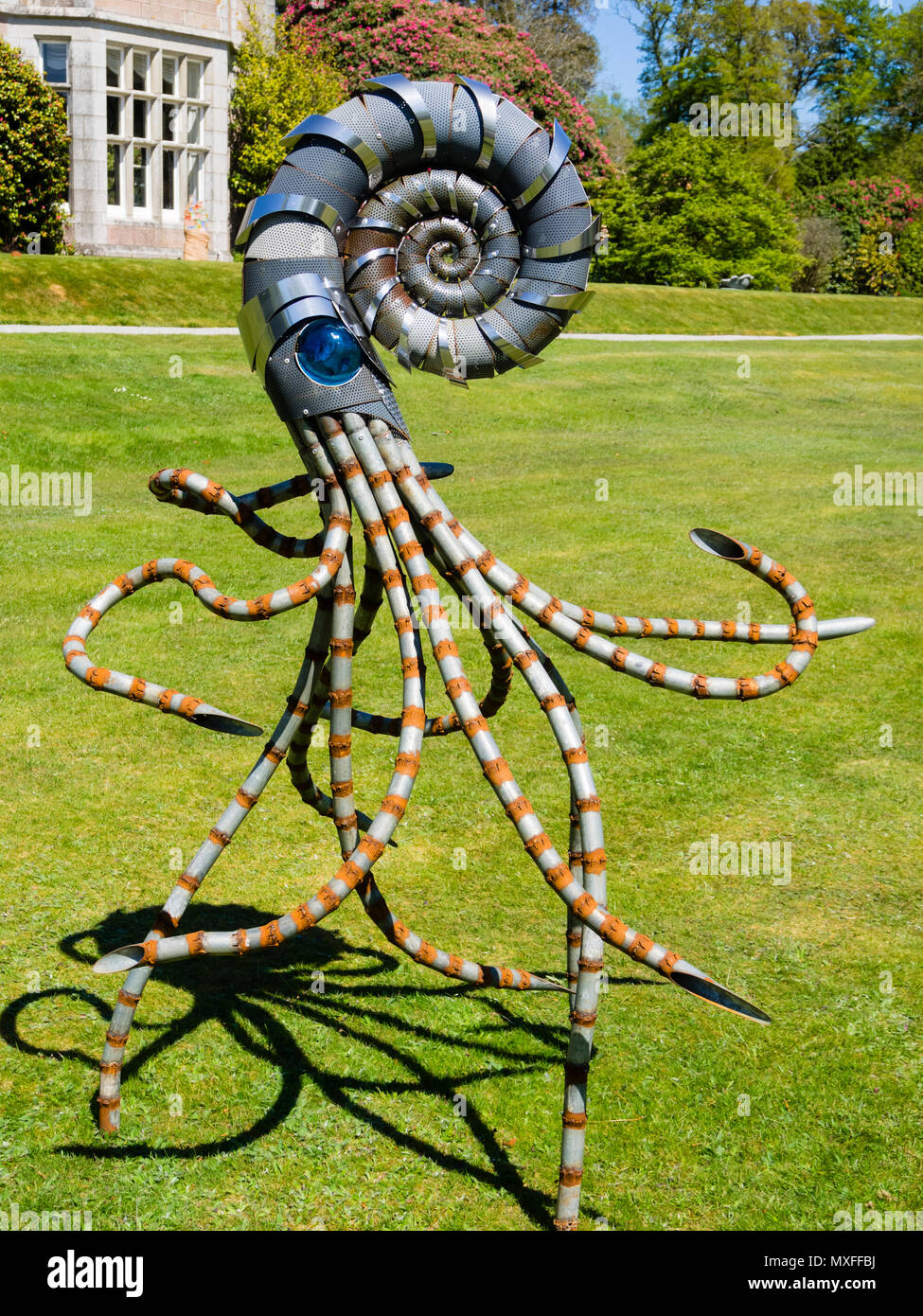 Walking Ammonite sculpture by Glenn Martin exhibited on the lawn at Delamore Arts exhibition, Devon, UK, 2018 Stock Photo