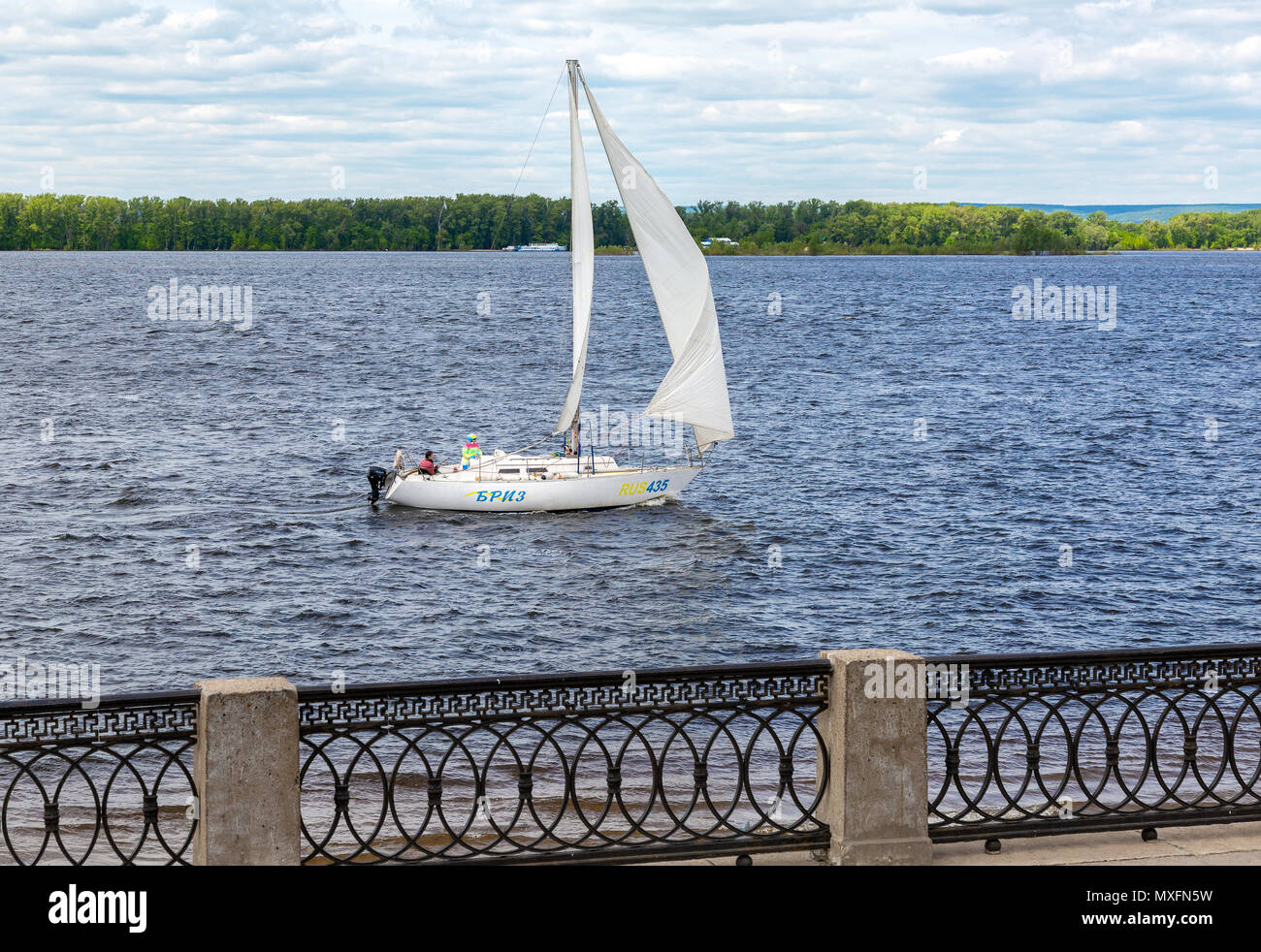 Samara, Russia - June 2, 2018: Sailing yacht floating on the Volga river in the summer sunny day Stock Photo