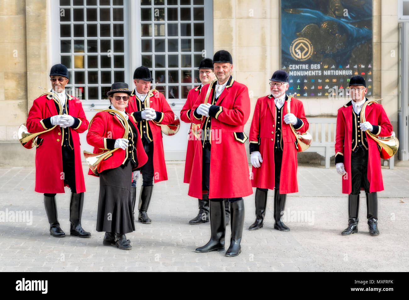 Group of seven hunting horn players in Reims, Grand Est, France taken on 27 June 2014 Stock Photo