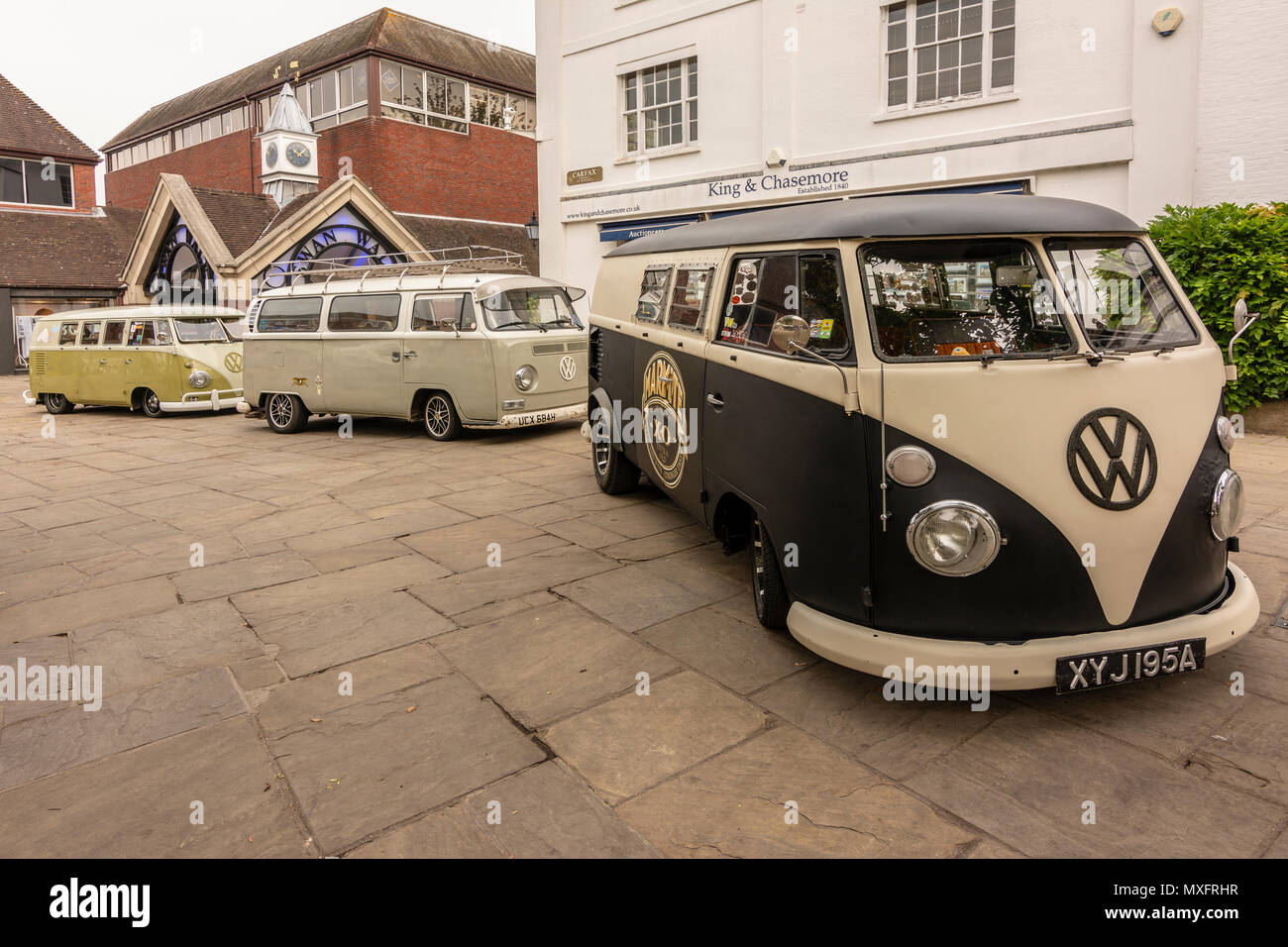 Three classic VW (Volkswagen) camper vans on display at the Plum Jam (2018) event, Horsham, West