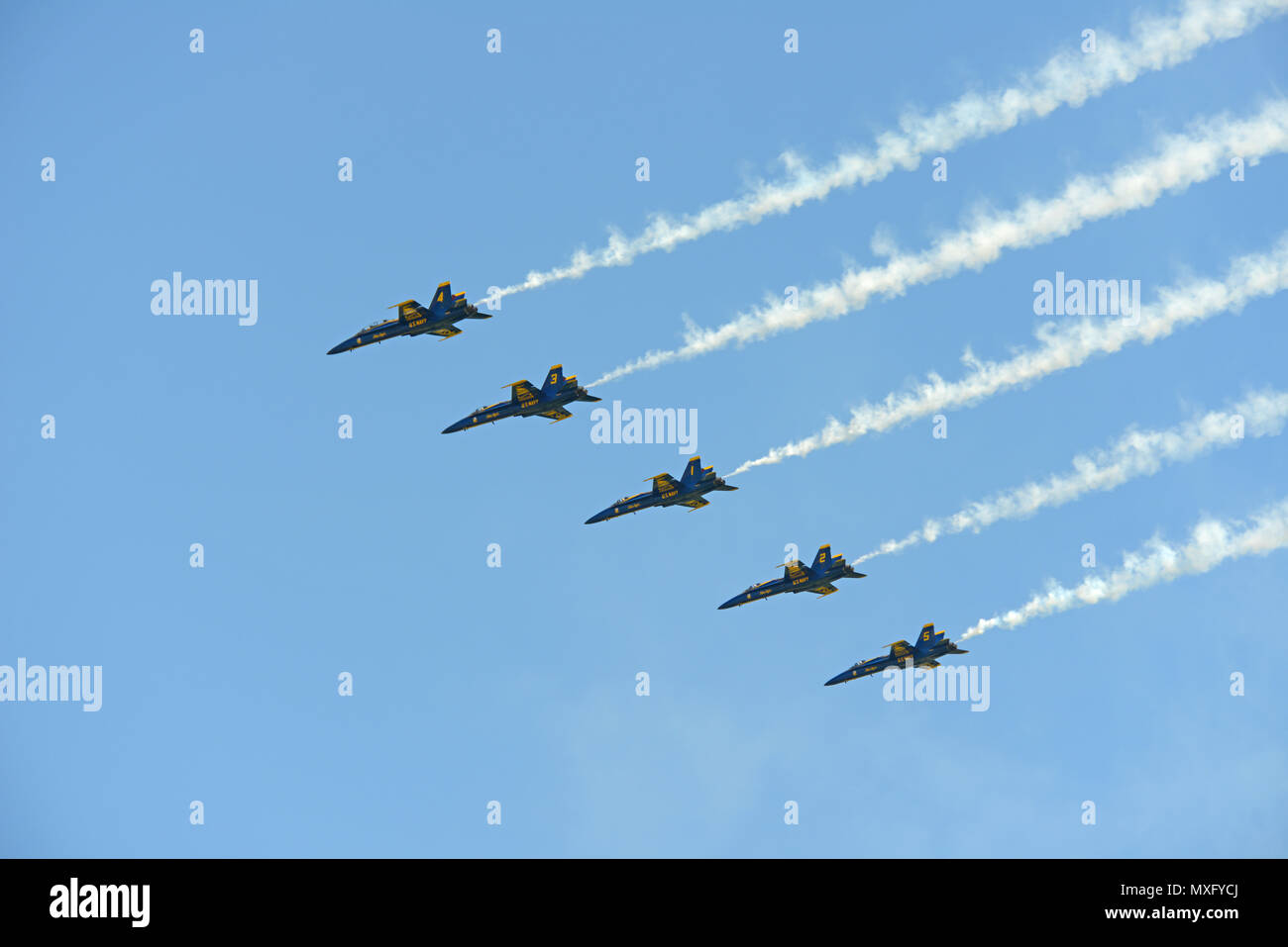 The Blue Angels flying in formation during an air show Stock Photo