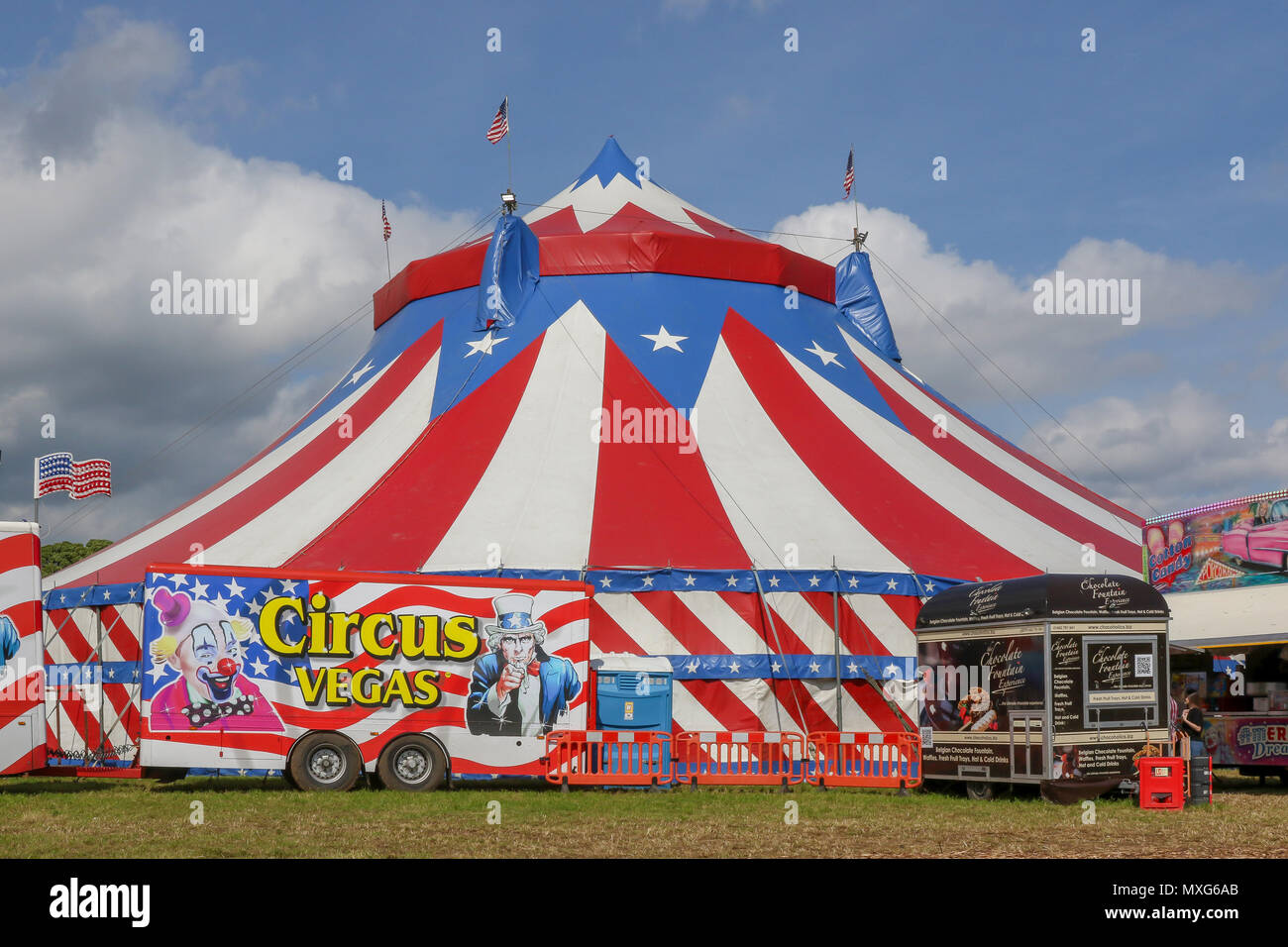 Red white and blue the colours of Circus Vgeas and its big top circus tent. Stock Photo