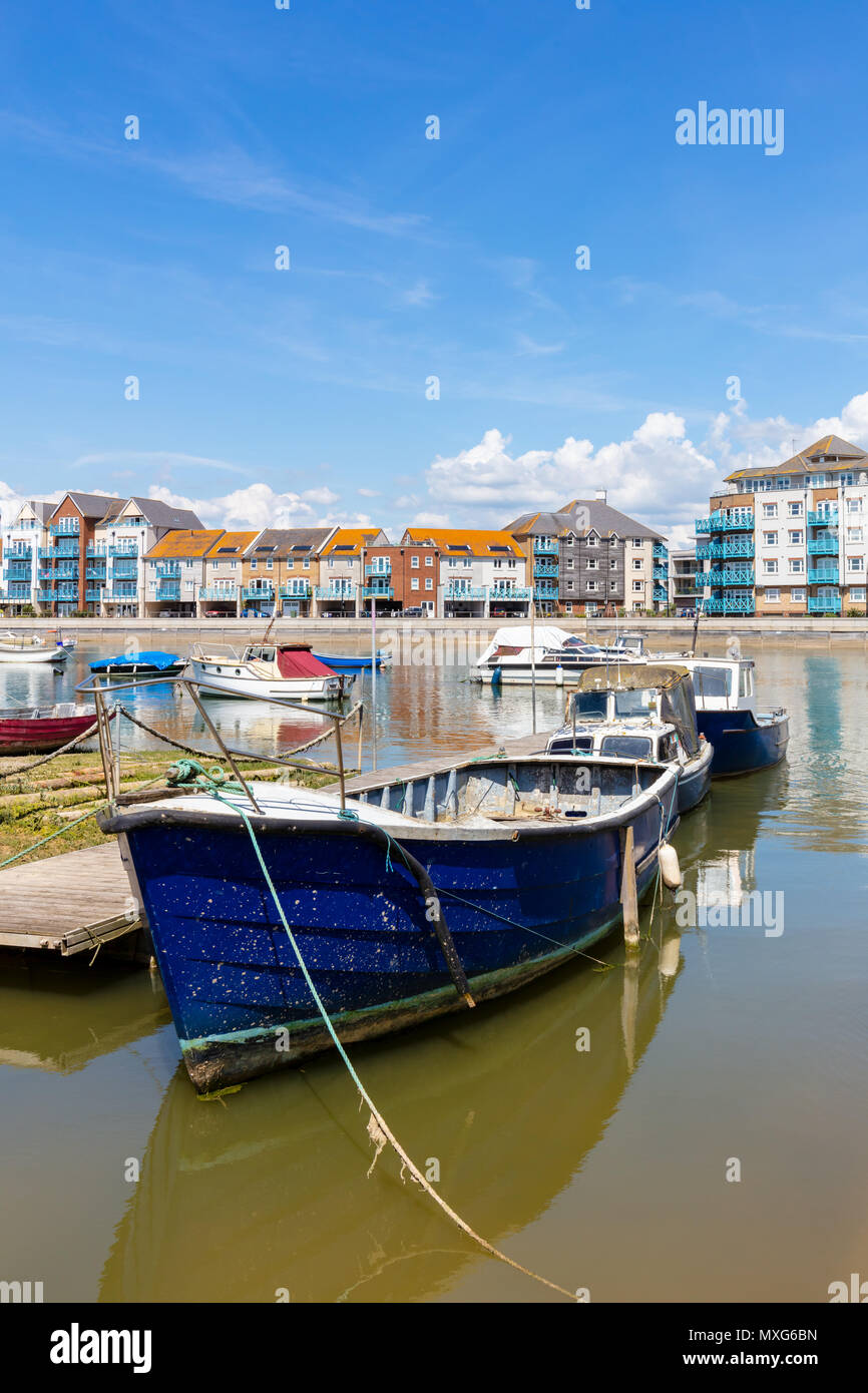 Shoreham-By-Sea, UK; 3rd June 2018; View of Boats on the River Adur With Smart Riverside Buildings on the Far Bank Stock Photo