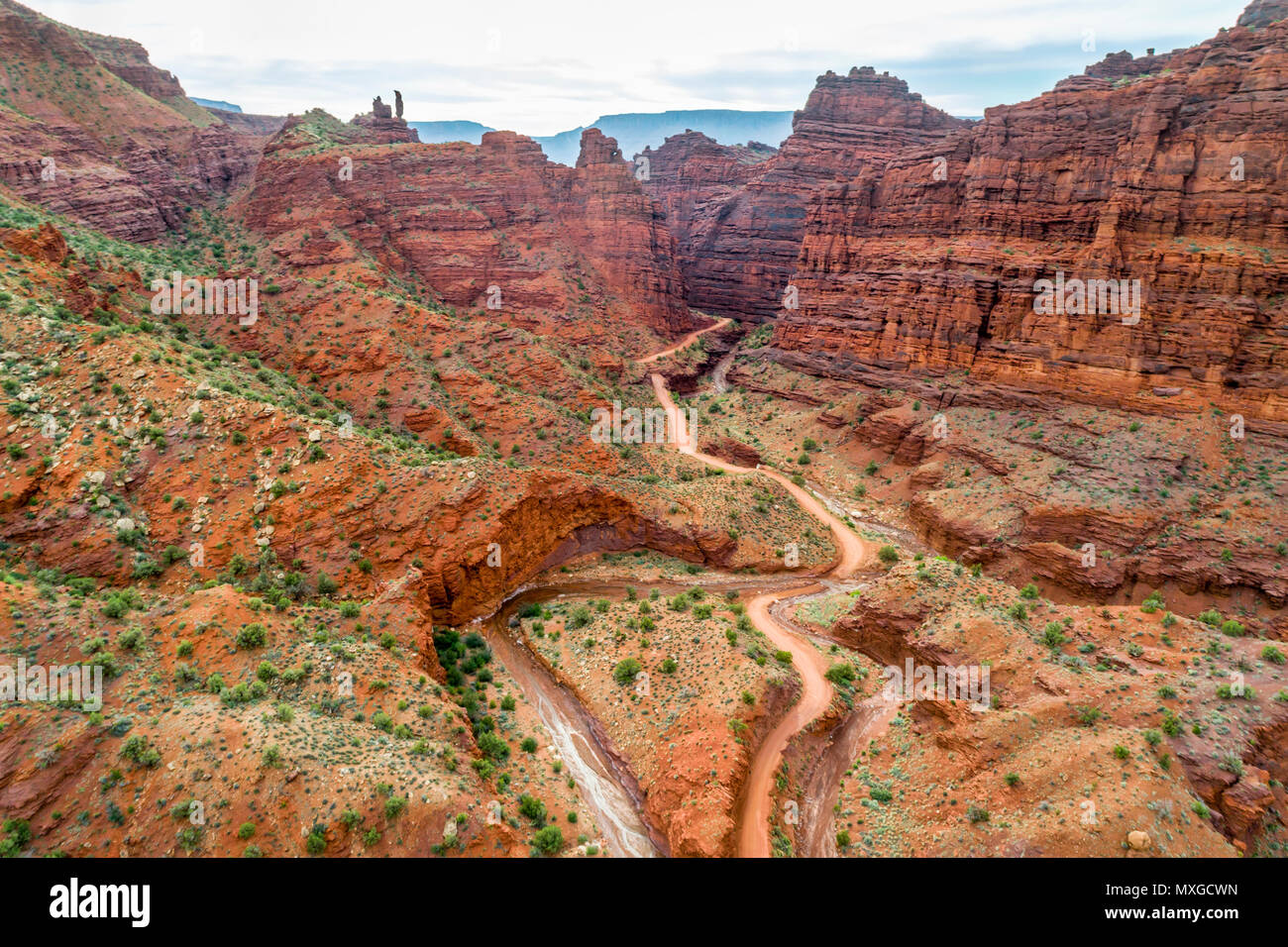 canyon road crosses a stream Onion Creek near Moab, Utah aerial