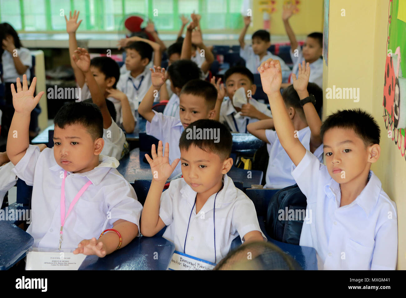 Quezon City, Philippines. 4th June, 2018. Students attend their class during the first day of school at the President Corazon C. Aquino Elementary School in Quezon City, the Philippines, June 4, 2018. Credit: Rouelle Umali/Xinhua/Alamy Live News Stock Photo