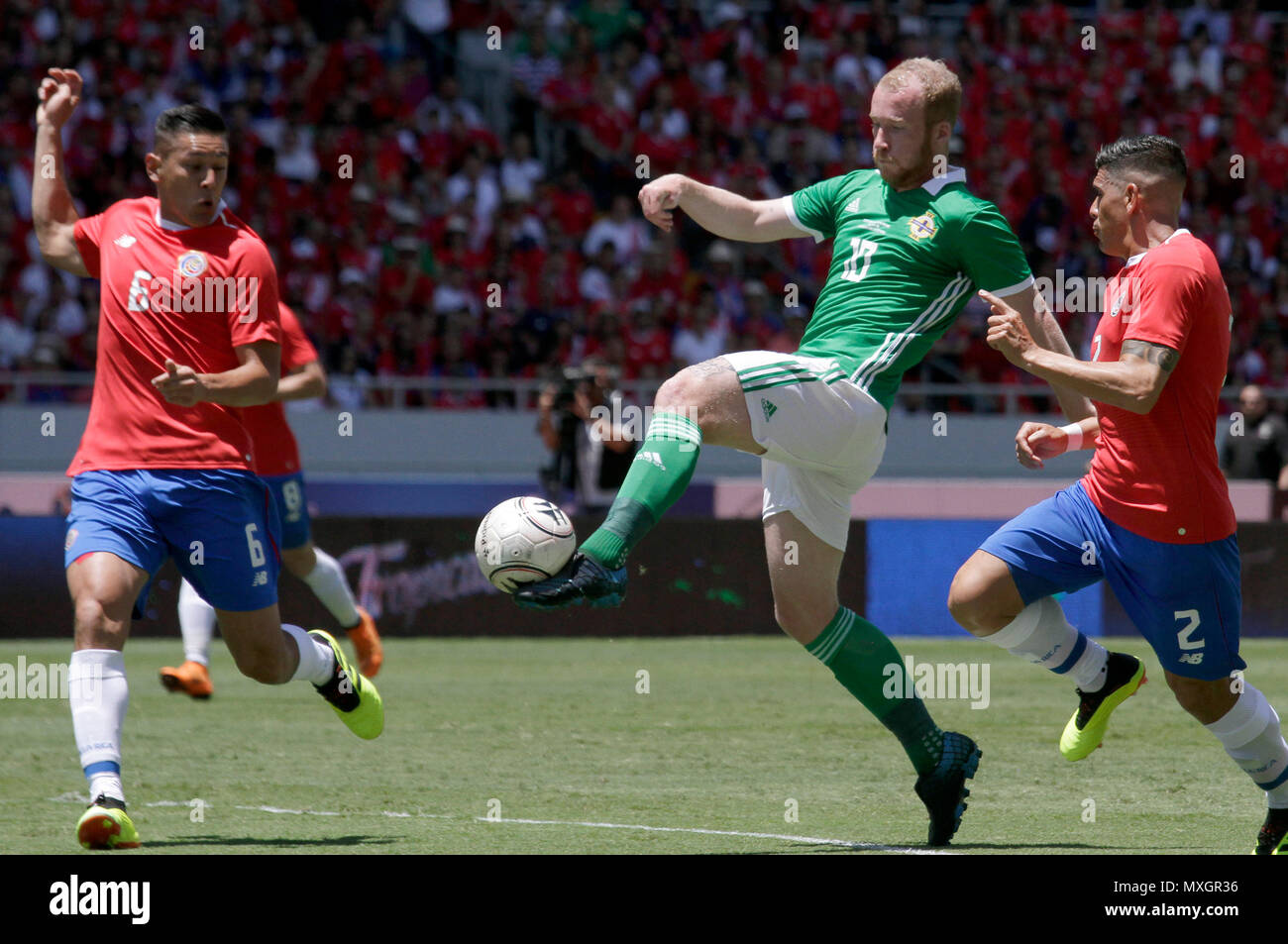 San Jose, Costa Rica. 3rd June, 2018. Oscar Duarte (L) and Johnny Acosta (R) of Costa Rica vie with Liam Boyce of Northern Ireland during an international friendly match prior to the FIFA World Cup Russia 2018 in San Jose, Costa Rica, on June 3, 2018. Costa Rica won 3-0. Credit: Kent Gilbert/Xinhua/Alamy Live News Stock Photo