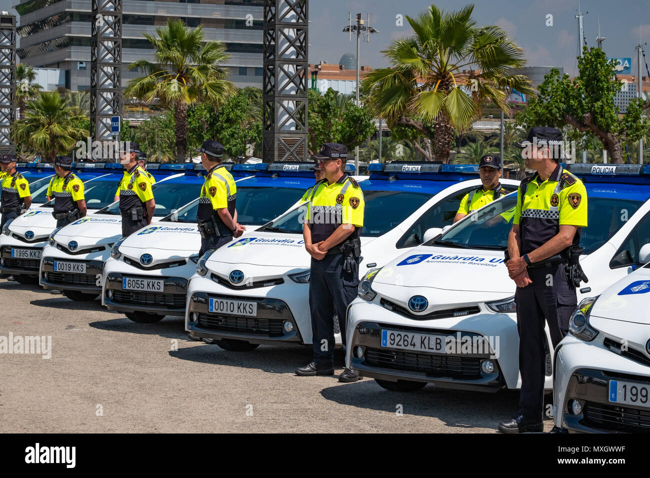 Barcelona, Spain. 4th June, 2018. New vehicles of the urban guard of Barcelona are seen with their police units. With the presence of Mayor Ada Colau and the security commissioner Amadeu Recasens, the presentation of the new patrol vehicle fleet of the Guardia Urbana de Barcelona Police  has taken place. The investment was 12.6 million euros. The new vehicles with a hybrid system allow a fuel saving of 608 euros per vehicle per year. These new cars are equipped with new communication technology and cameras with license plate recognition. Stock Photo