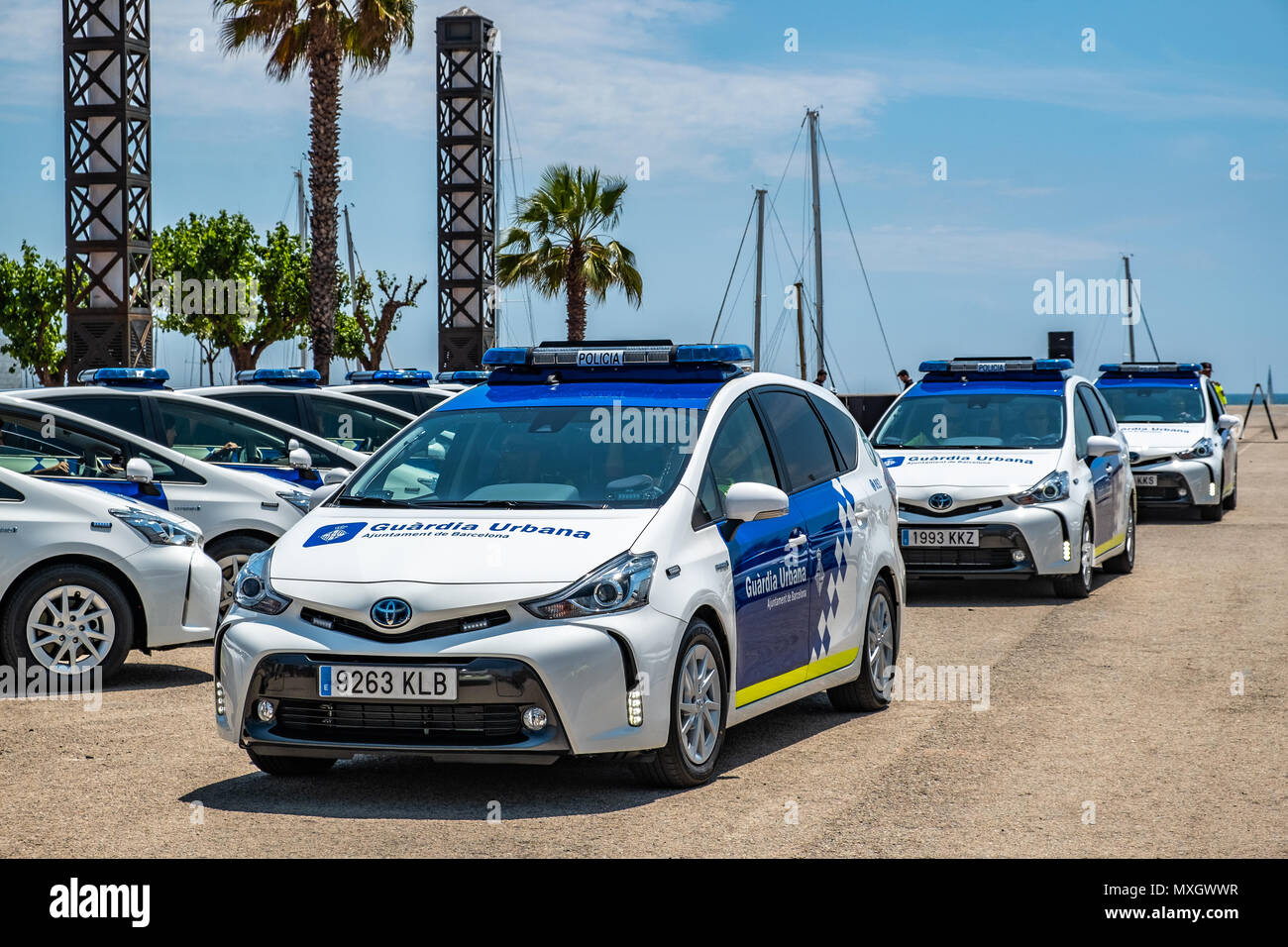 Barcelona, Spain. 4th June, 2018. New vehicles of the Urban Guard during the presentation. With the presence of Mayor Ada Colau and the security commissioner Amadeu Recasens, the presentation of the new patrol vehicle fleet of the Guardia Urbana de Barcelona Police  has taken place. The investment was 12.6 million euros. The new vehicles with a hybrid system allow a fuel saving of 608 euros per vehicle per year. These new cars are equipped with new communication technology and cameras with license plate recognition. Stock Photo