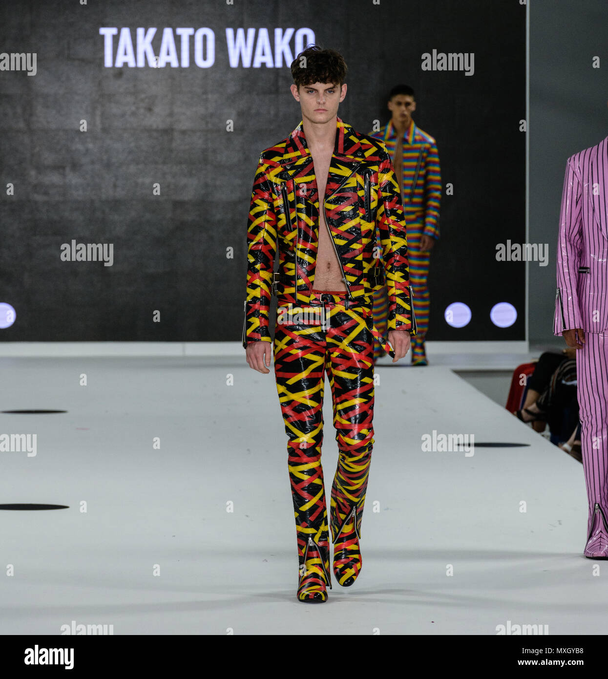 Takato Wako's brilliant Vynl Mens Collection shown at Nottingham Trents show at Graduate Fashion Week in London 2018 Credit: Marc Wainwright Photography/Alamy Live News Stock Photo