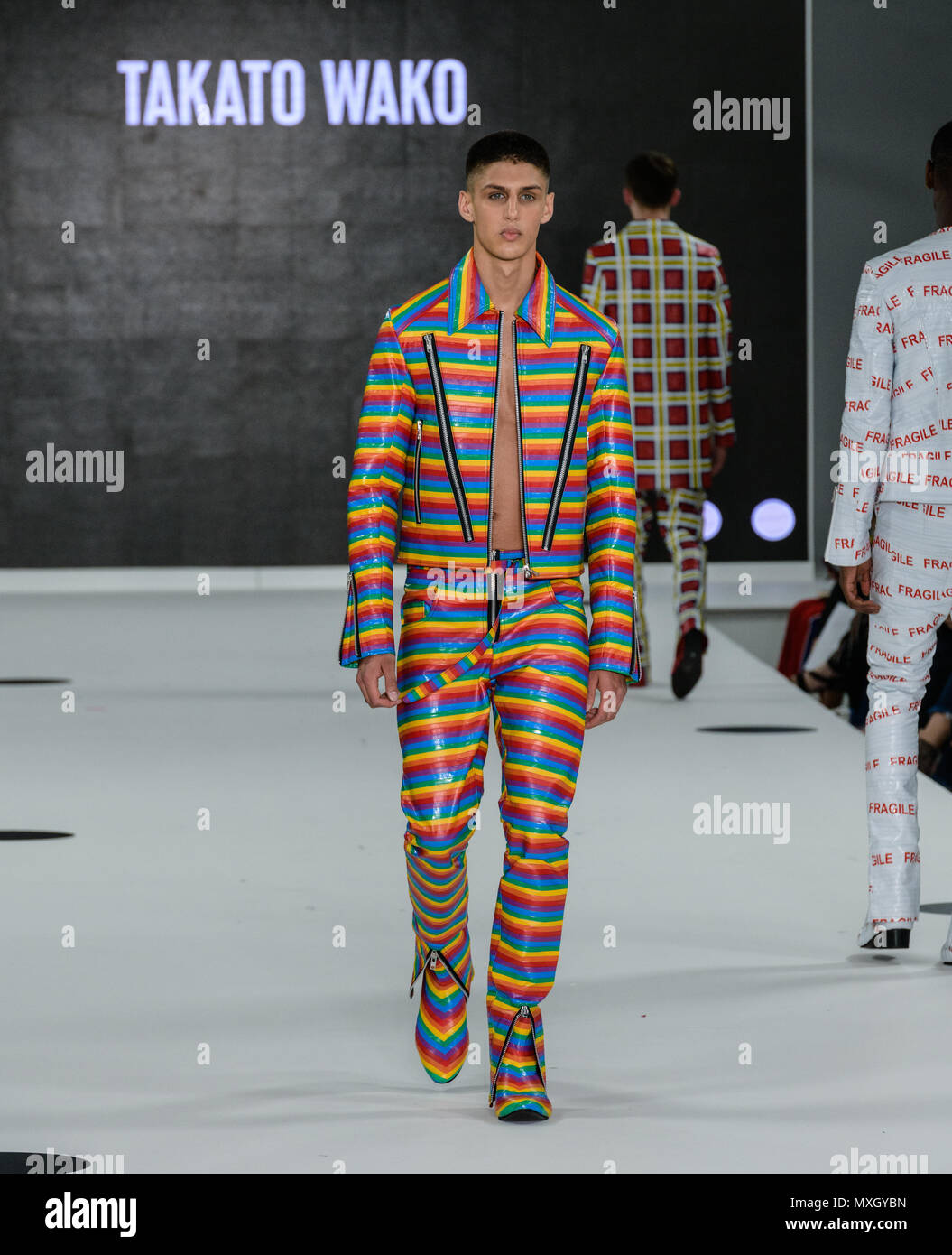 Takato Wako's brilliant Vynl Mens Collection at Nottingham Trents show at Graduate Fashion Week in London 2018 Credit: Marc Wainwright Photography/Alamy Live News Stock Photo