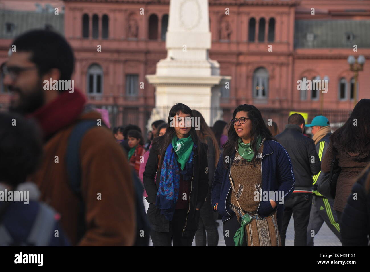 Buenos Aires, Buenos Aires, Argentina. 4th June, 2018. Demonstrators, most of them bearing the pro legal abortion campaign symbol, a green kerchief, gather at May Square prior to the ''Ni una menos'' rally. ''Ni una menos'', Spanish for ''Not one woman less'' is an Argentine feminist movement that started in 2015 after the murder of 14 years old Chiara Paez, and is now spread across several Latin American countries, campaigning against gender violence. Credit: Patricio Murphy/ZUMA Wire/Alamy Live News Stock Photo