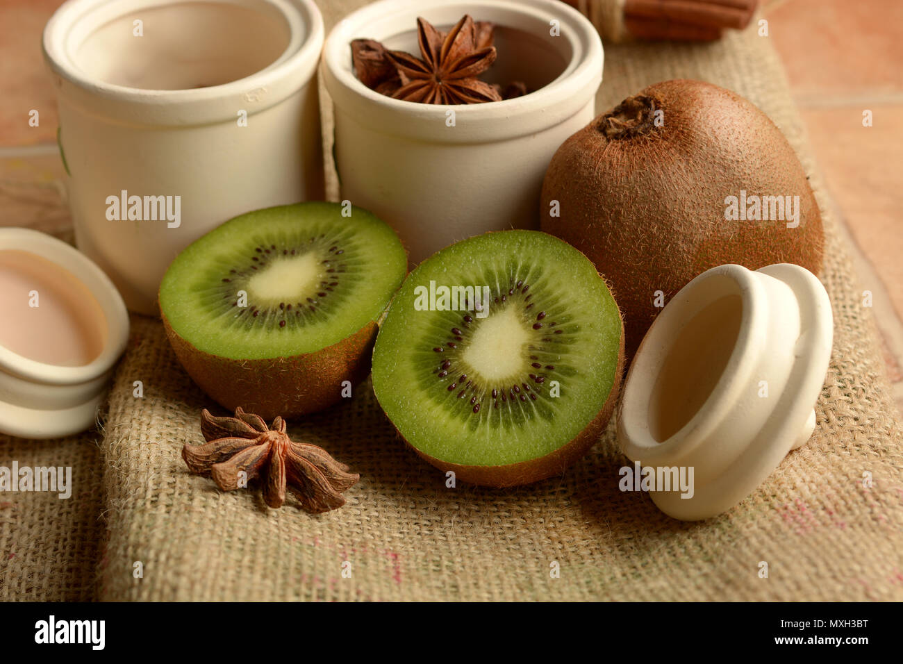 ripe kiwi cut in two - emerald green - closeup Stock Photo - Alamy