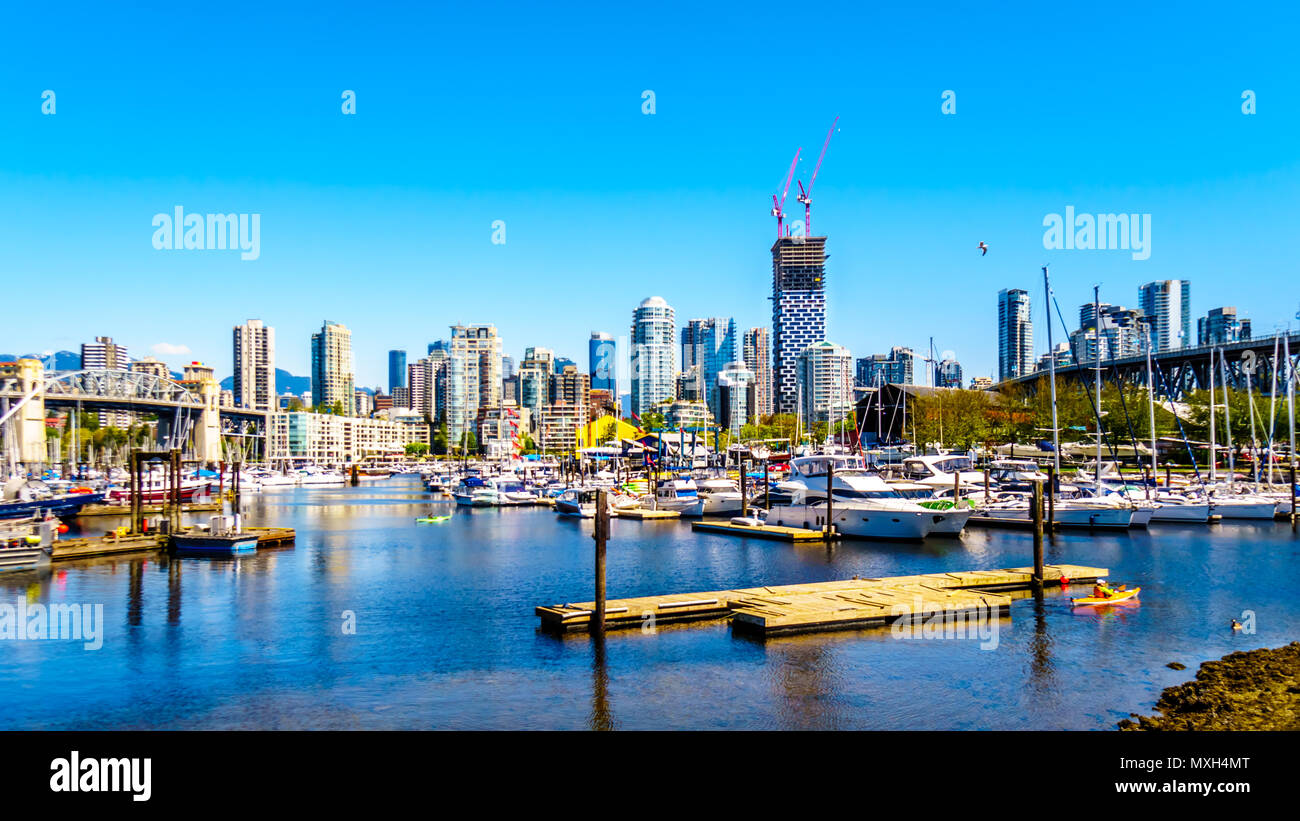 The international harbor of beautiful Vancouver with the many sailboats at the famous False Creek area in British Columbia, Canada Stock Photo